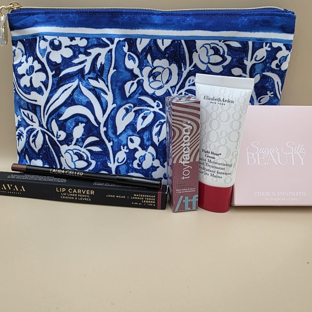 Estee Lauder Blue Floral Cosmetic Bag With Beauty Products - Picture 2 of 3
